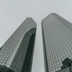 Modern Deutsche Bank Twin Towers in Frankfurt, Germany - corporate office buildings representing different German company types like GmbH, UG, AG, and KG for foreign investors